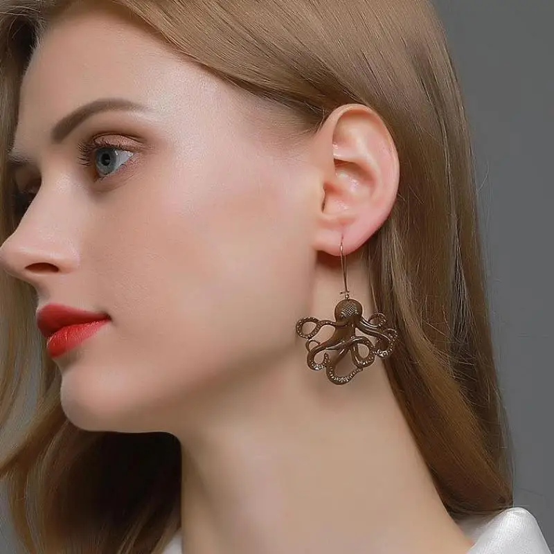 

Серьги-подвески в виде осьминога кофейного цвета