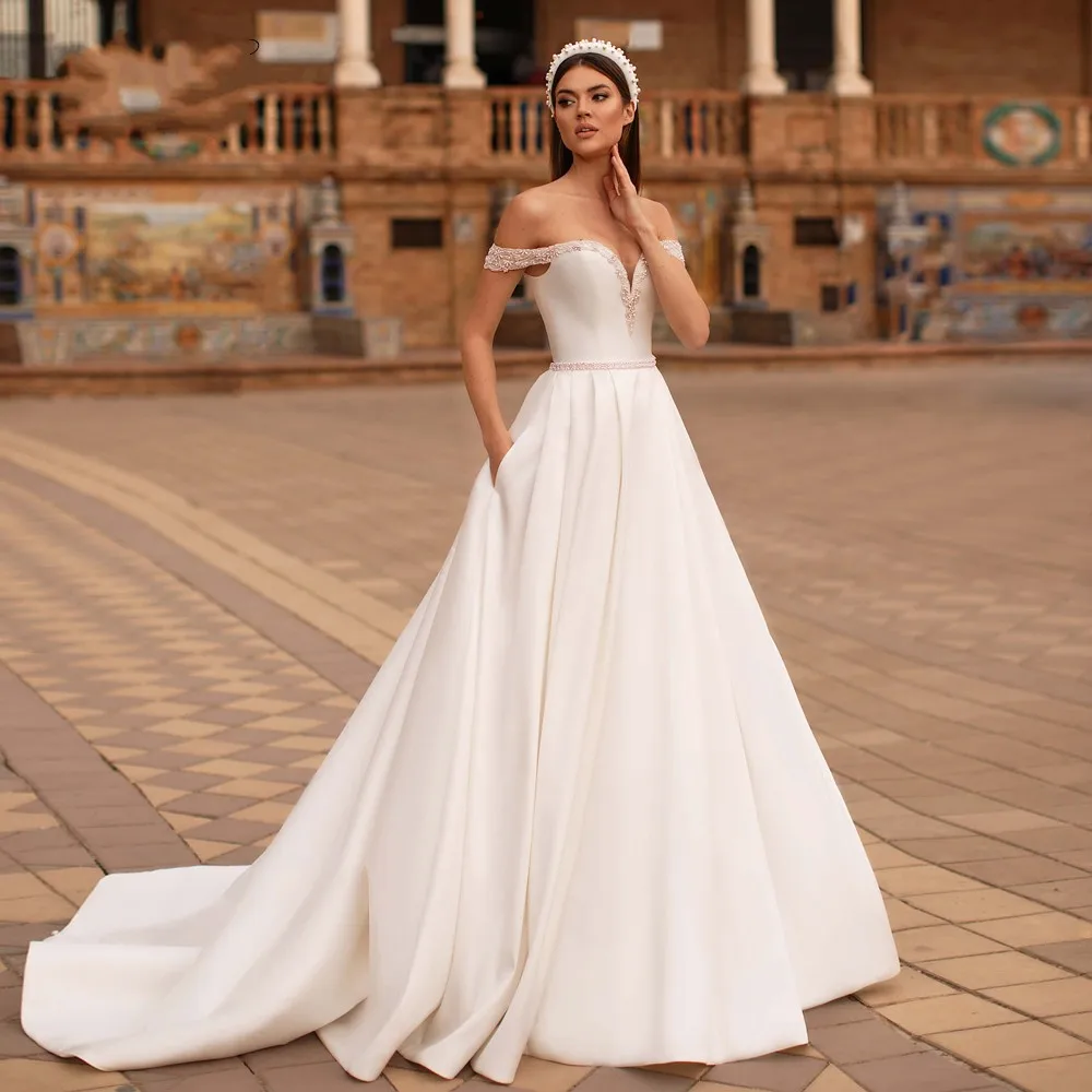 

Wedding Dresses 2023 De Noiva Sexy Boat Neck Vintage Luxury Beaded Pearls Sashes Matte Satin A Line Bride Gown
