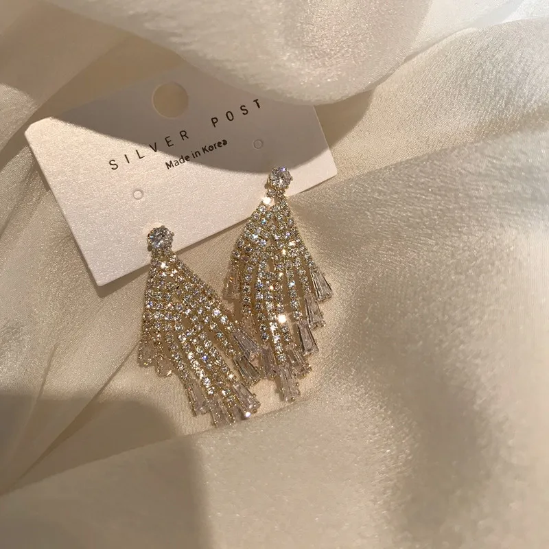 

Needle Exaggerated Long Tassel Earrings Female Personality Thin Net Red Super Flash Earrings European And American