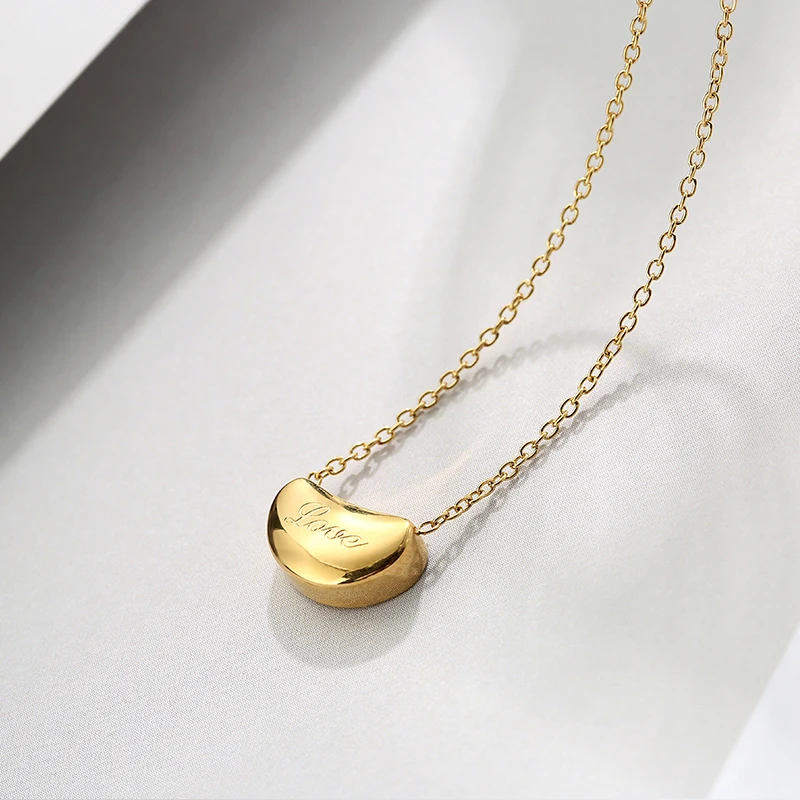 

Engraved LOVE alphabet small gold bean necklace design IPG18K gold-plated titanium steel beans minimalist lucky clavicle chain