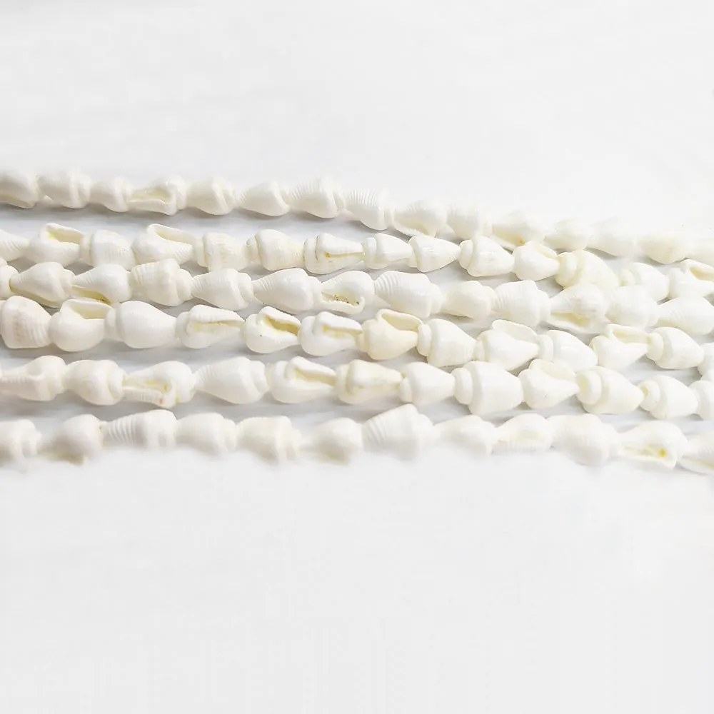 Белые раковины россыпью бусины из натурального материала для самостоятельного