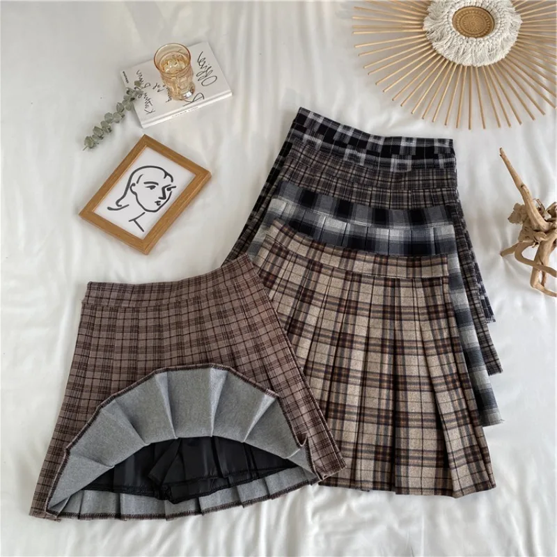 

style plaid pleated skirt Korean female spring and autumn high waist thin A-line short skirt student woolen thick skirt