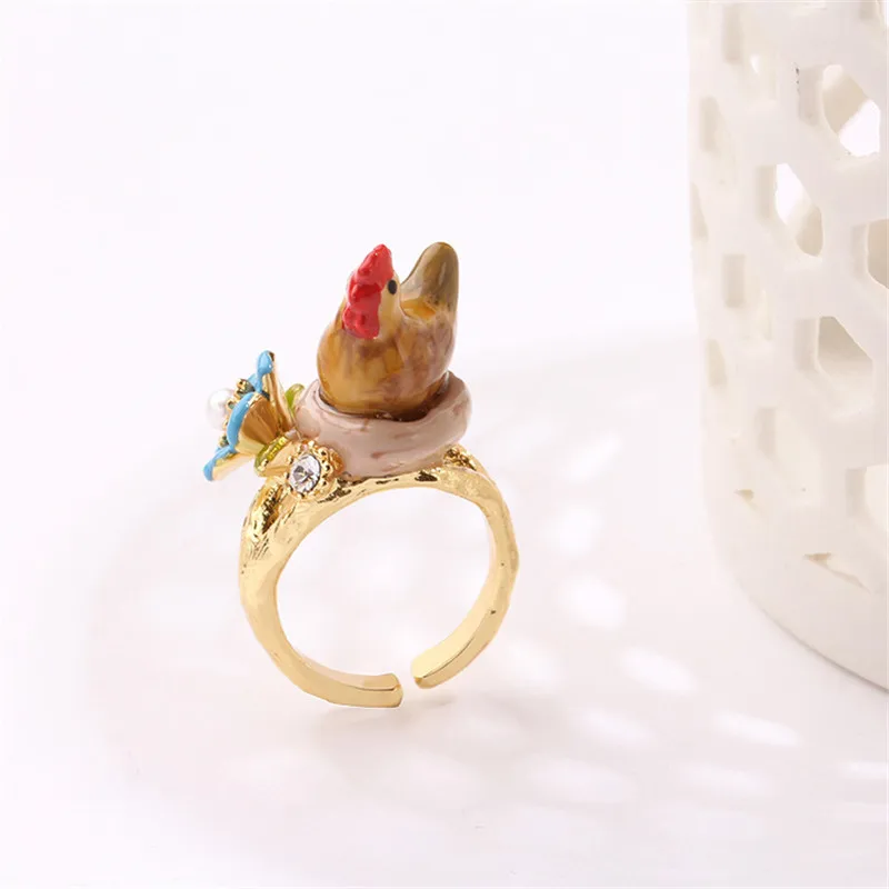

New trend fashion temperament cute chick flower hand-painted enamel gold-plated open ring niche design sense ring