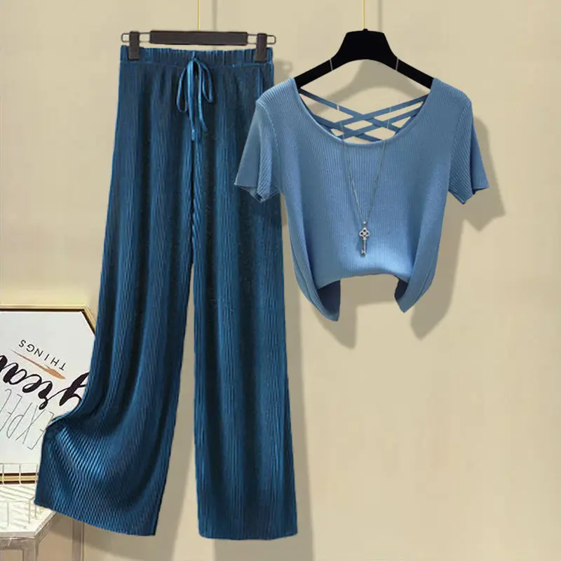 

Женские трикотажные спортивные костюмы, комплект из 2 предметов, футболка с коротким рукавом и круглым вырезом + широкие брюки с высокой тал...