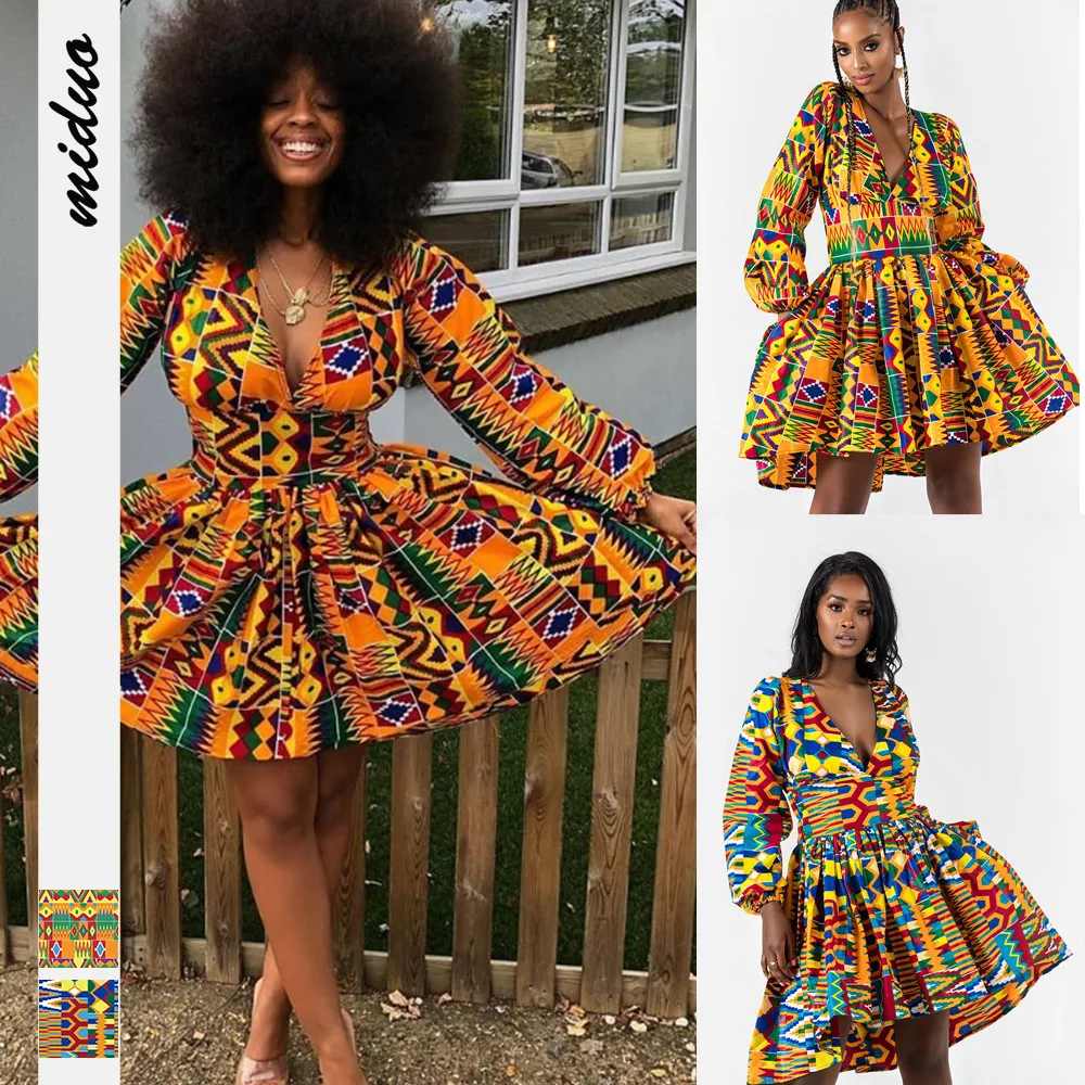 

Женское платье с глубоким V-образным вырезом, открытой спиной и принтом