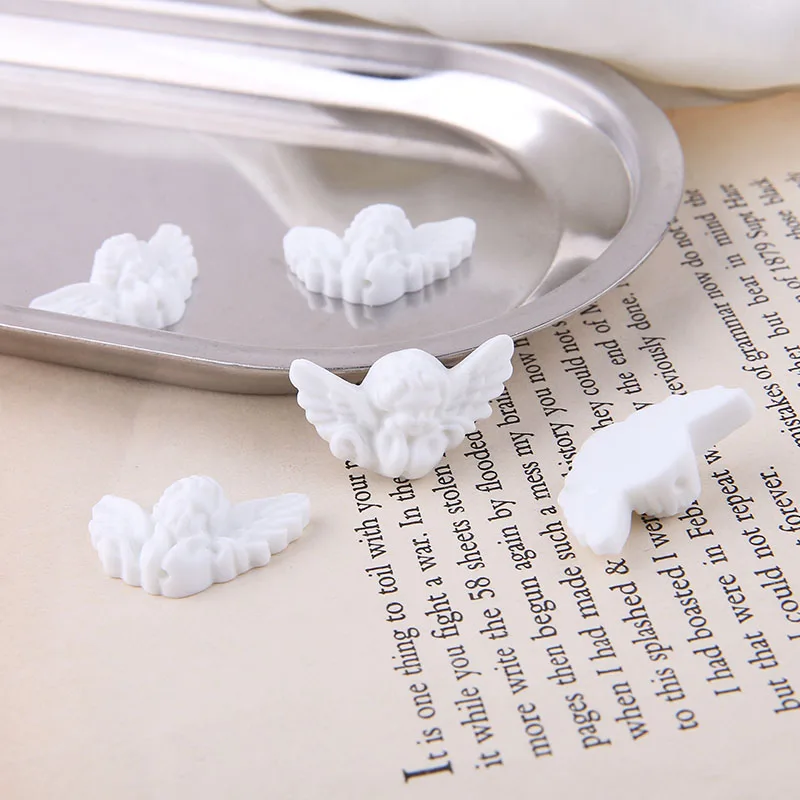 

Retro style 50pcs/lot cartoon white little angel shape resin Straight hole beads diy jewelry earring/garment accessory