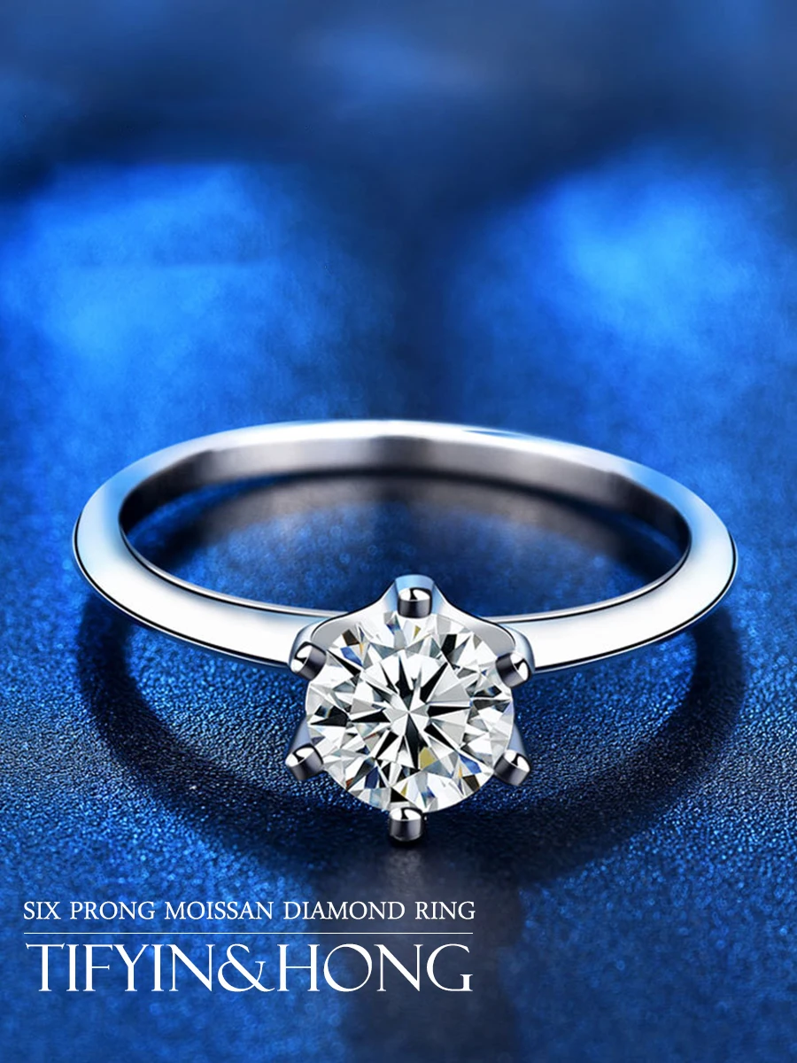 

Кольцо из серебра 100% пробы с муассанитом и бриллиантами на шести зубцах