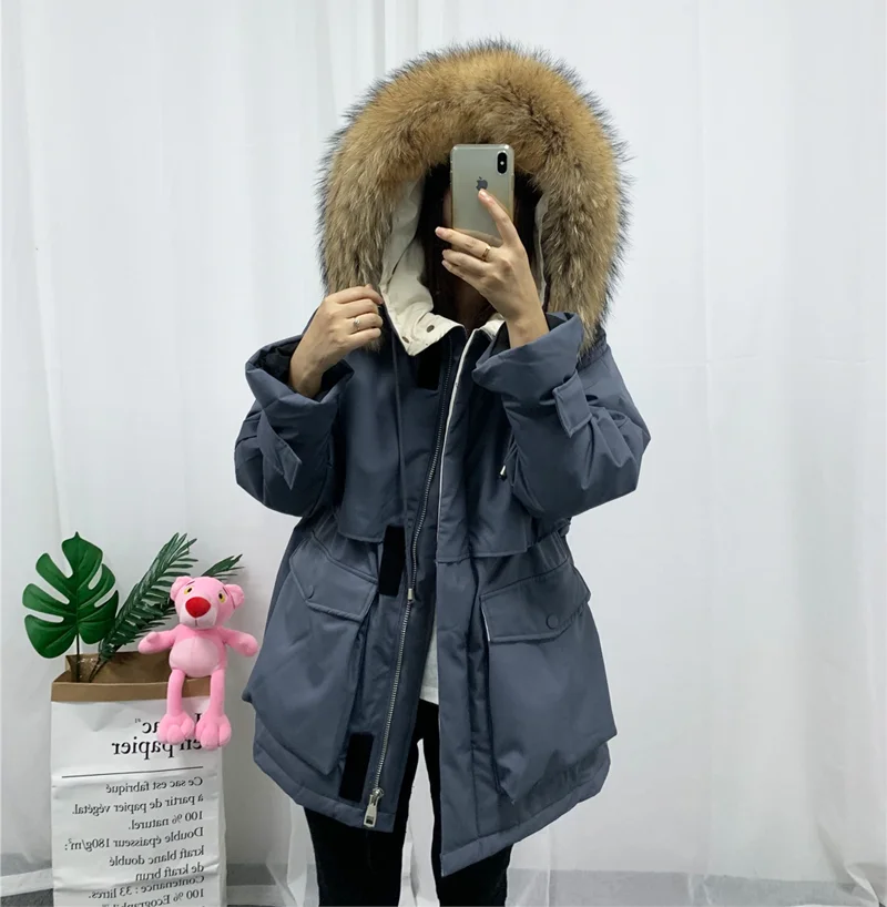 Женская зимняя куртка с капюшоном из меха енота 90% белый пуховик толстые парки