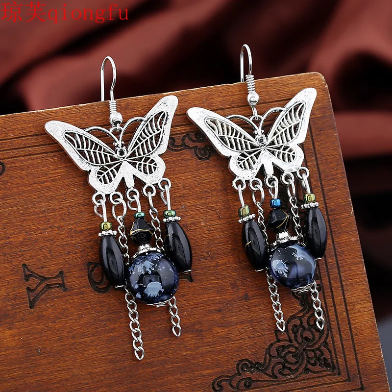 

Bohemian Europe and America Retro Hollow Butterfly Tassel Earrings Jewelry Chain Tassel Personality Lucky Earrings