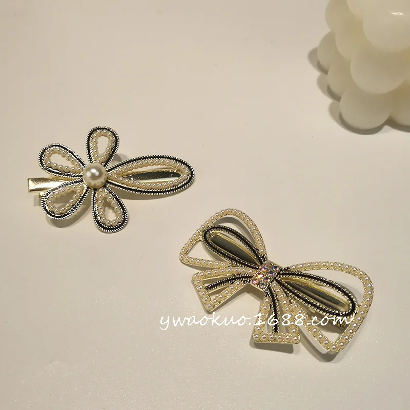 

Korean version of female hair pearl bow hairpin fashion inlaid zircon flower hairpin girl tassel clip popular women’s gift