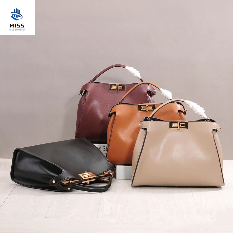 

2020 new ladies bag Fashion luxury cow leather handbag Rotating buckle large kitten bag Women's Crossbody Shoulder Bags