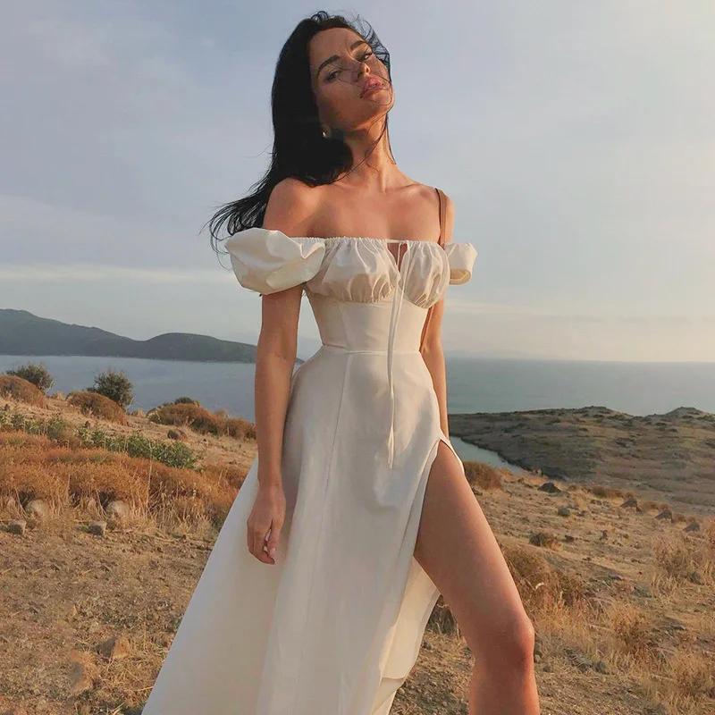 

Summer new French temperament square neck bubble sleeve high split white long skirt sexy low cut lace up dress