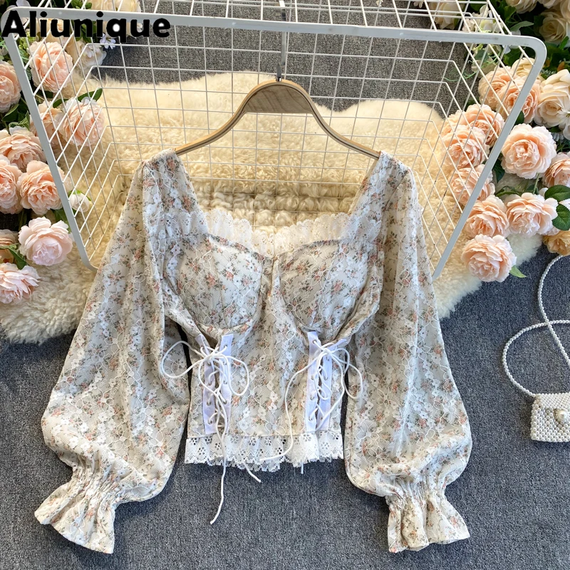 

Aliunique New Lace Sexy Lacing Shirt for Momen Summer 2021 V-neck Lantern Sleeve Women Blouses Loose Sexy Floral Short Shirt