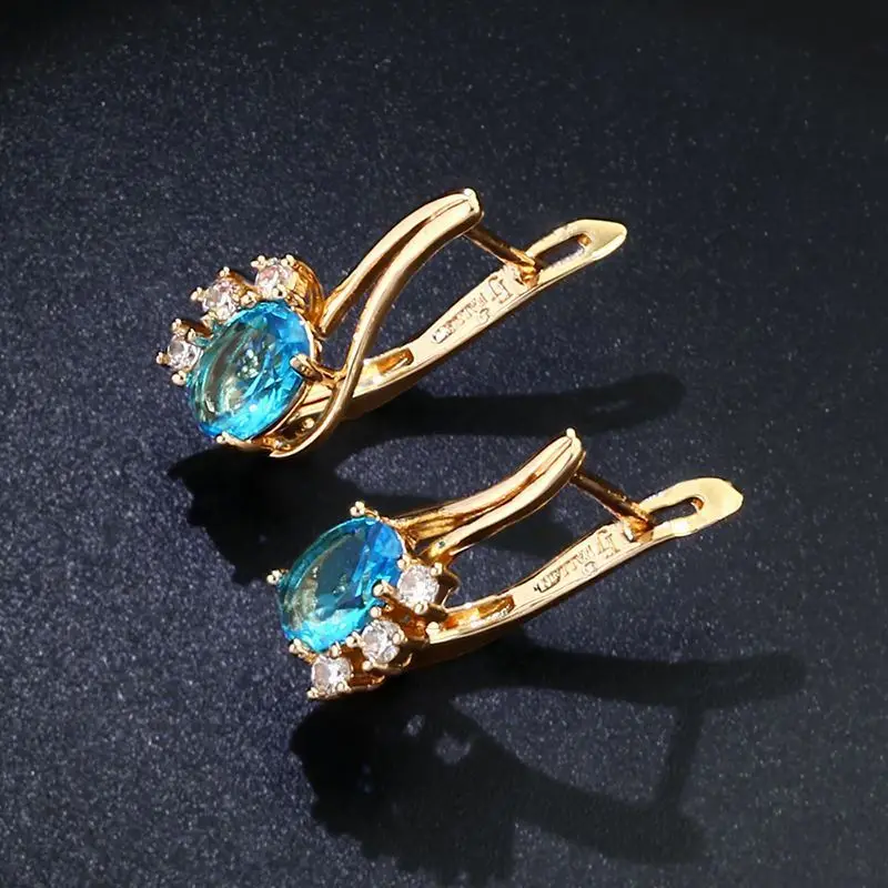 Серьги-гвоздики 585 розовое золото голубые циркониевые праздничные подарки