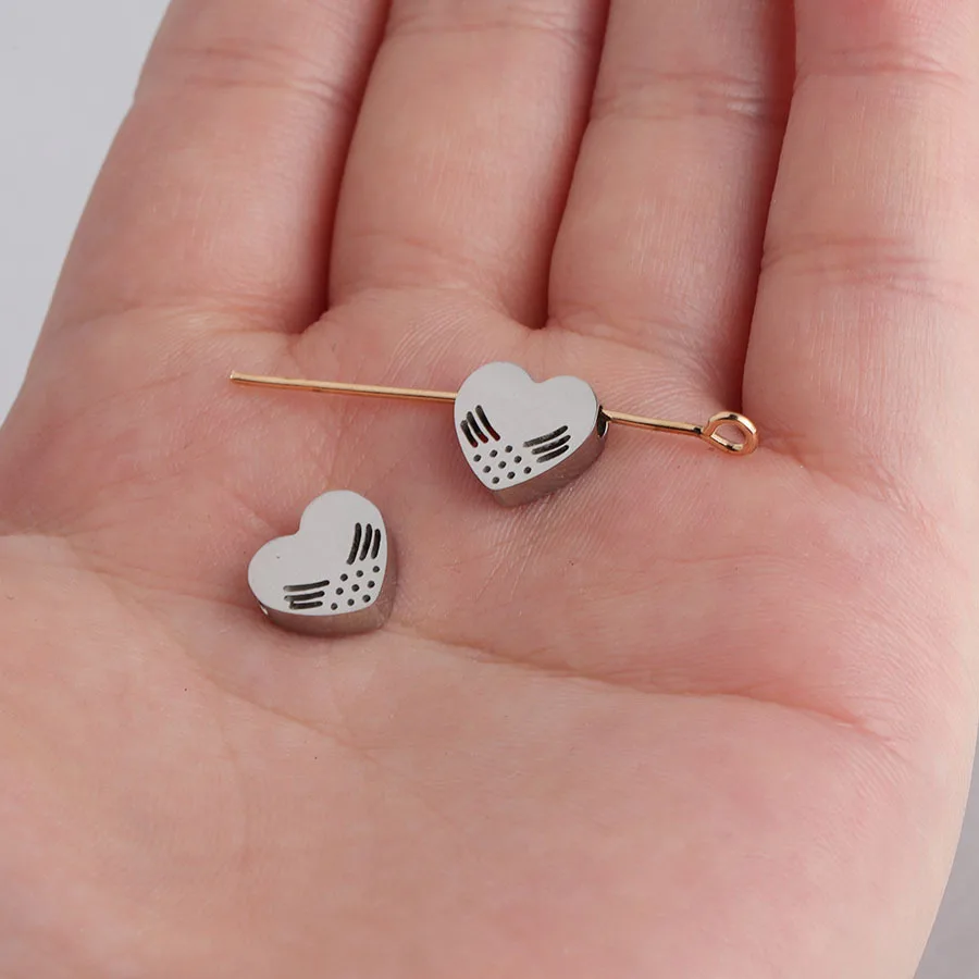 

Jaymaxi Hollow Angel Wings Heart Charms Love Small Hole Beads Mirror Polished Stainless Steel Beads 20Pieces/lot