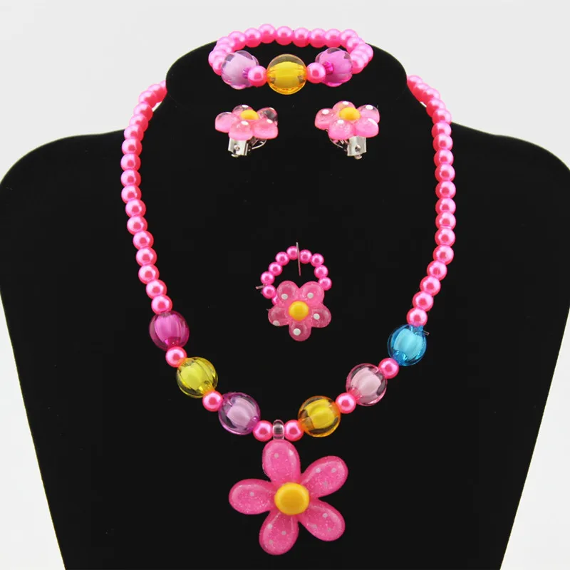 

4pcs Lovely Girl Kids Sun Flower Necklace Bracelet Rings Earclip Imitation Pearls Flower Children Sets