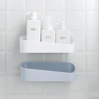 the bathroom is strongly pasted to the wall mounted plastic free punching wall storage rack geometric modeling bathroom rack