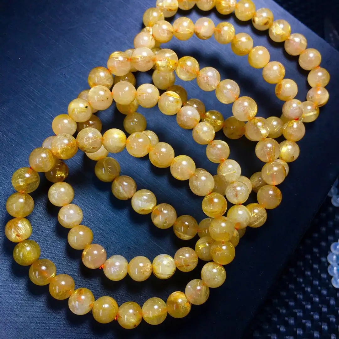 

Natural Brazilian golden hair crystal bracelet titanium crystal gold wire crystal hand string lovers transport popular jewelry