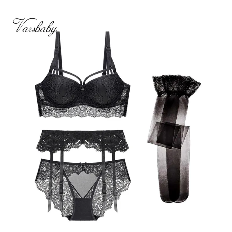 Комплект женского кружевного бюстгальтера пуш ап с подвязками трусиками и