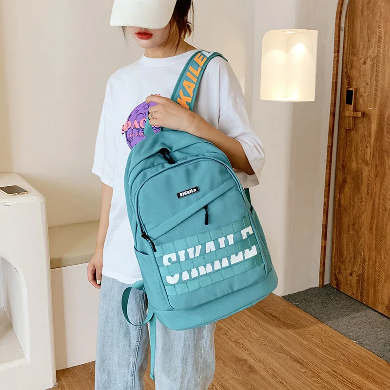 

Schoolbag Female Korean 2021 New Preppy Style Junior High School Student Backpack Simple Letter Backpack Outdoor Travel Bag