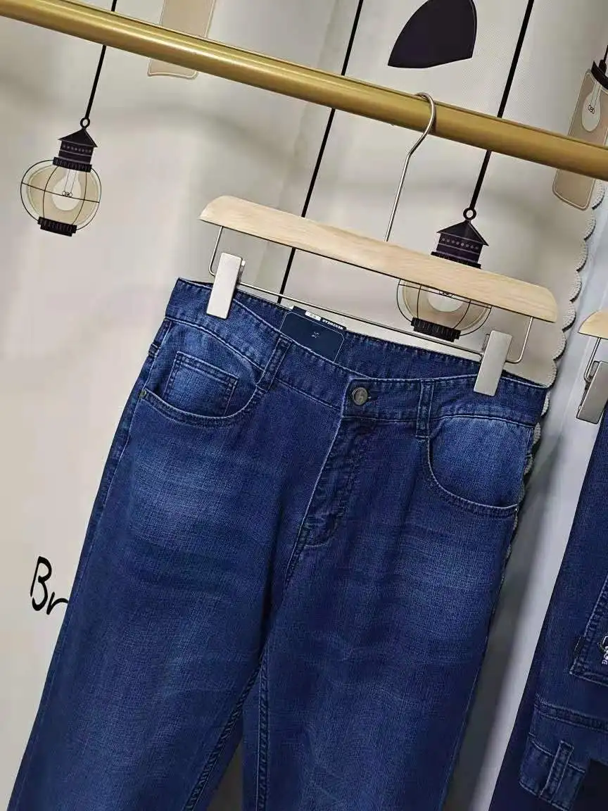 

Spring and summer new jeans elastic straight tube business no iron show thin show leg long men's pants