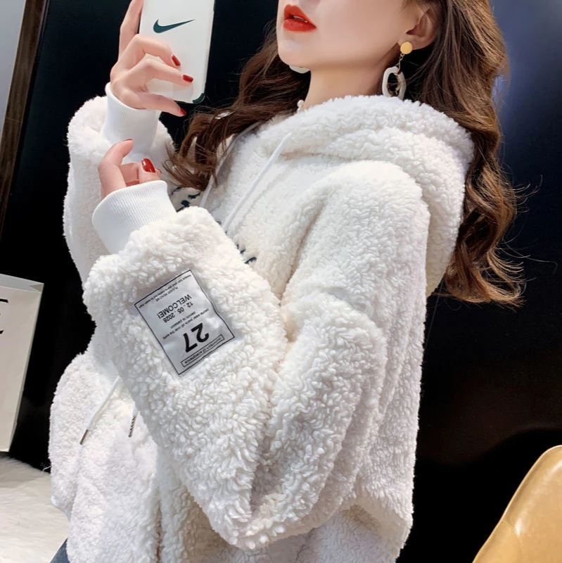 

Autumn and winter 2021 new plush thickened loose hooded Pullover imitation lamb wool medium and long sweater women's top fashion