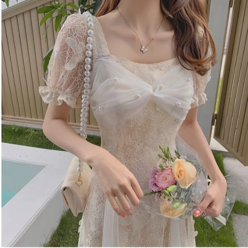 

Summer White Fairy Dresses Casual Chic Short Sleeve Princess Party Dress Women Elegant French Vintage Lace Sweet Midi Dress 2021