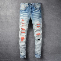 street fashion men jeans retro light blue elastic slim fit destroyed ripped jeans men patches designer hip hop denim punk pants