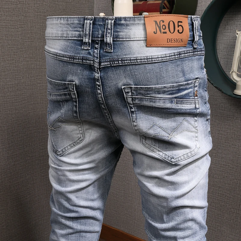 Fashion Streetwear Men Jeans Light Blue Elastic Ripped Jeans Men Embroidery Vintage Designer Slim Pants Streetwear Hip Hop Jeans