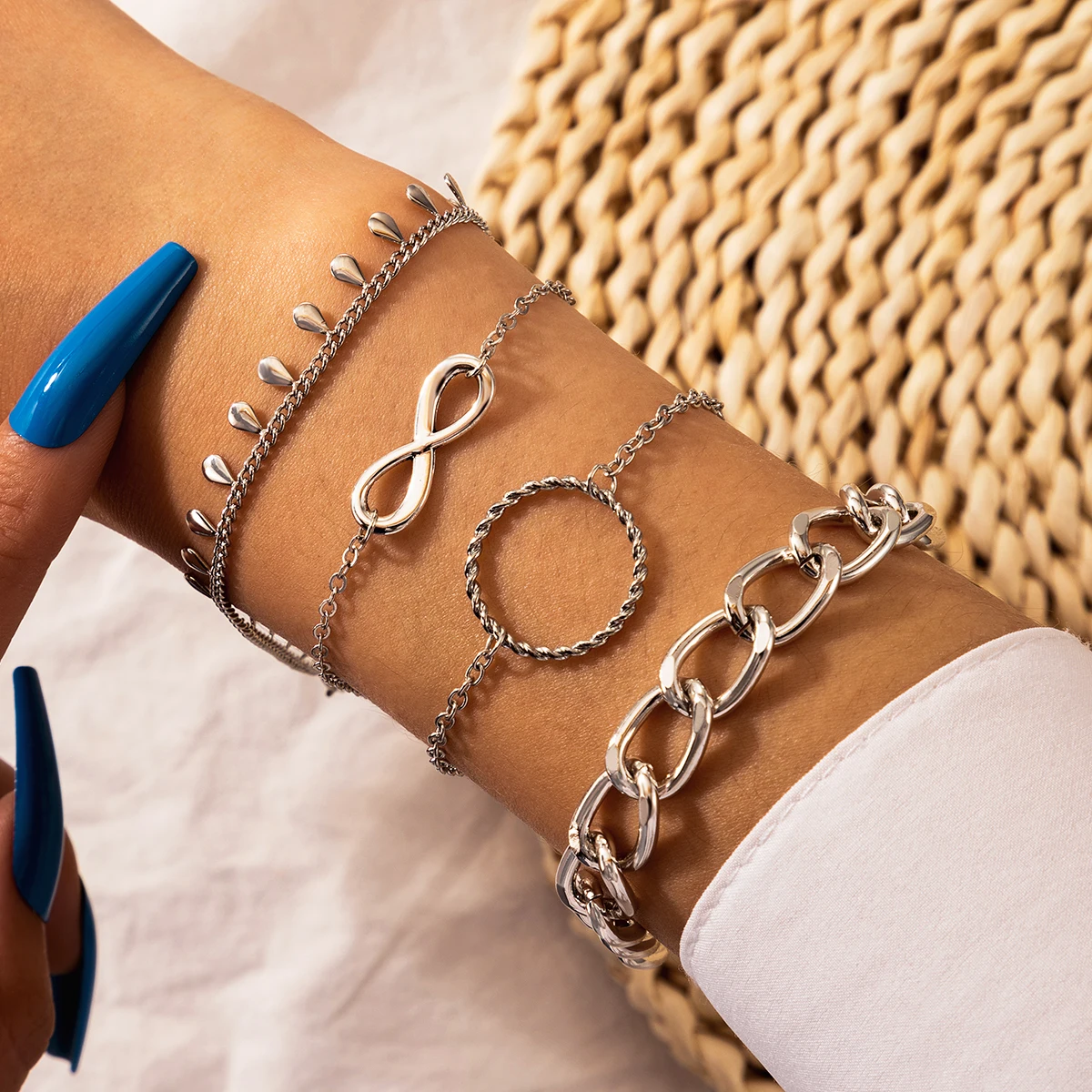 

docona 4pcs/set Bohemia Infinity Tassel Bracelet Set for Women Charms Adjustable Hollow Geometry Metal Bracelet Jewelry 16908