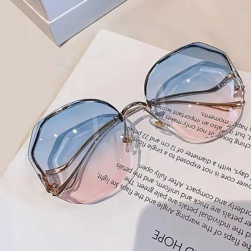 

Sunglasses Women Trending Rimless Sun Glasses Fashion Round Gradient Lenses Luxury Designer Men Driving Glasses Decorative UV400