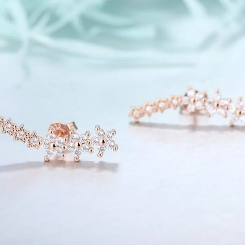 Женские Двухсторонние серьги-гвоздики с фианитами в форме звезд Цвет Розовое