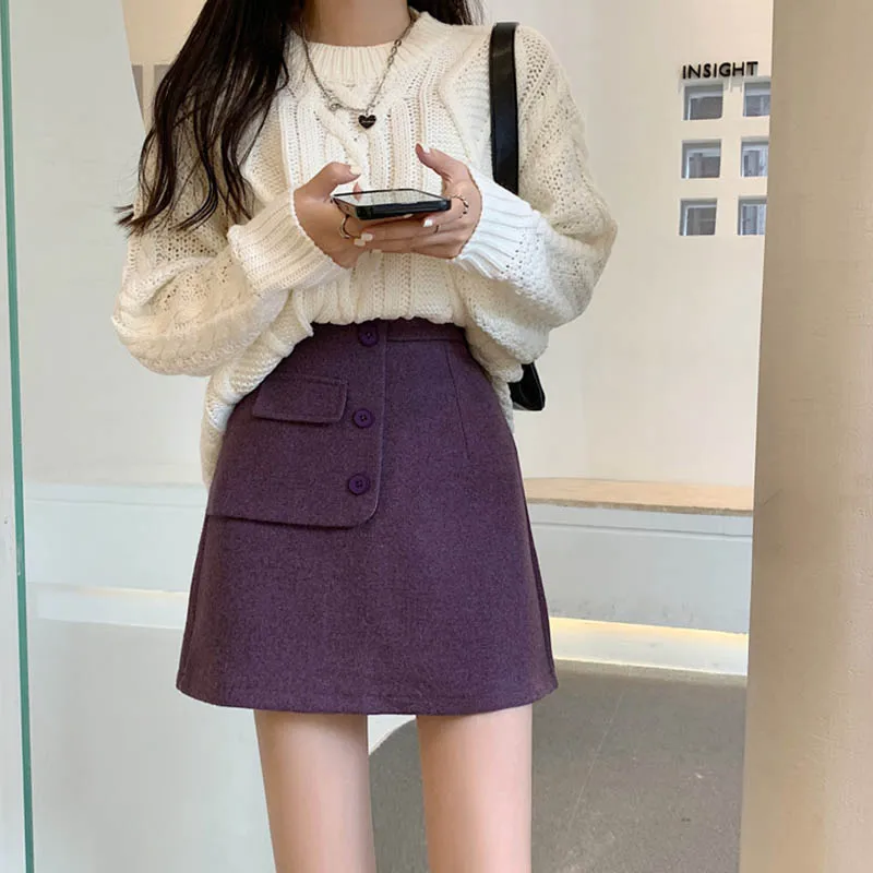 

2021 осень/зима новая Корейская версия с плотным шерстяным накладным карманом и приталенной юбкой А-силуэта с высокой талией.
