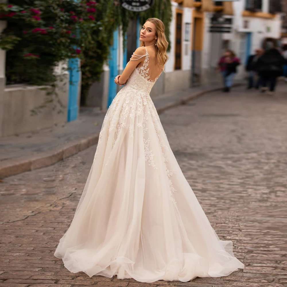 

Elegant A Line Wedding Dresses Sheer Scoop Neck Pearls Applique Tulle Bridal Gown Robe De Mariee Backless Bride Dress