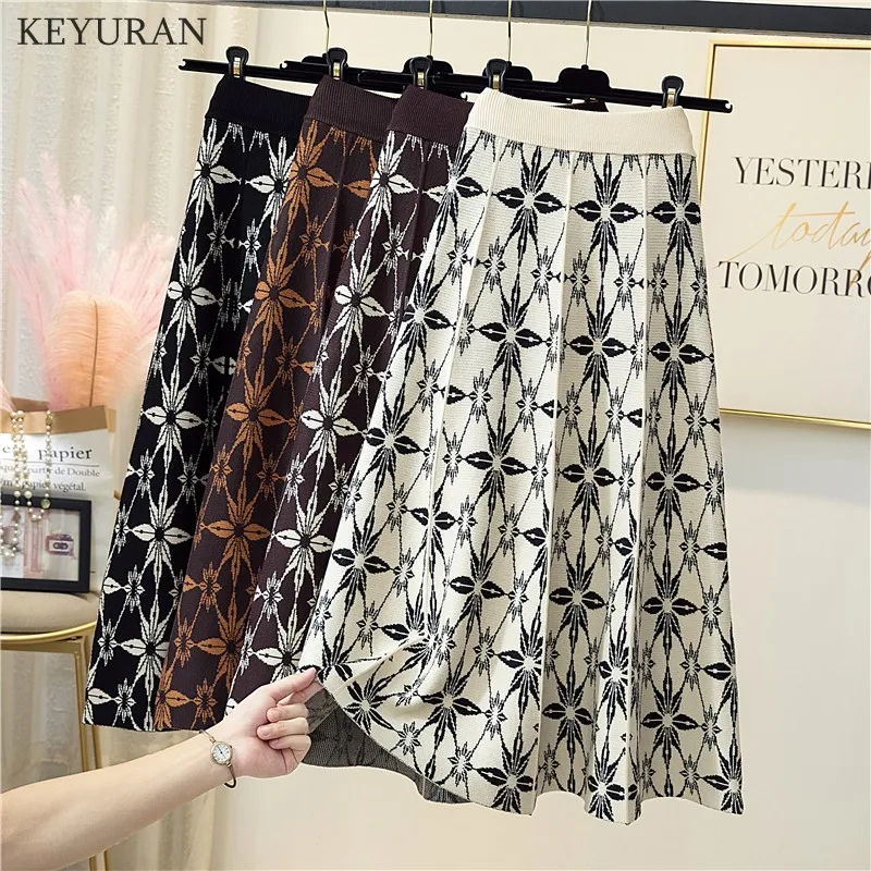 

2021 Autumn Winter Flower Jacquard Pleated Knitted Skirts Women Elastic High Waist Long Umbrella Skirts Thick Warm Midi Skirt
