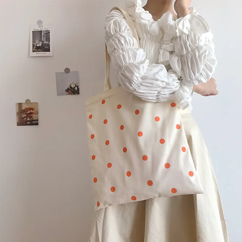 

Хлопчатобумажная холщовая Экологически чистая Сумка-тоут через плечо и через плечо с принтом оранжевых точек CY0877