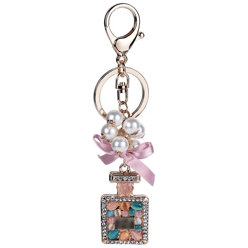 

High Quality Women Keychain Fashion Jewelry Bag Charm Rhinestone Opals Keyring Creative Perfume Bottle Key Chain Ring Wholesale