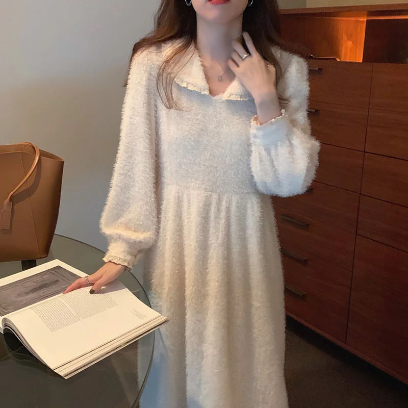 

Корейское шикарное темпераментное свободное универсальное платье средней длины с круглым вырезом и пышными рукавами