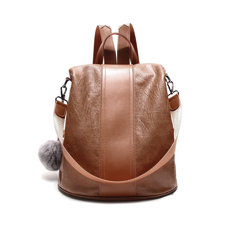 Фото Модный женский рюкзак с заклепками Универсальный из натуральной кожи для отдыха