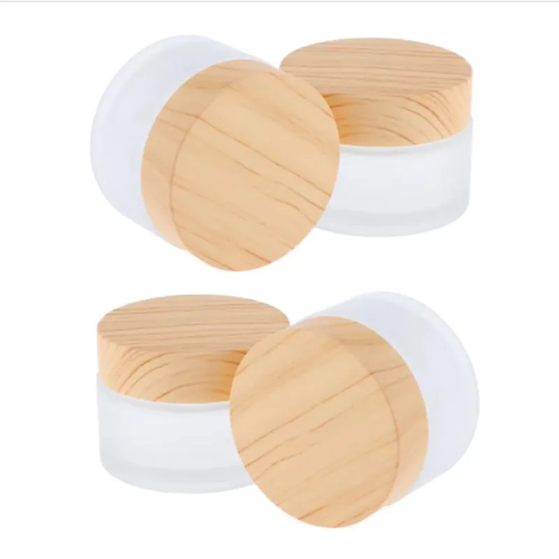 

12 x 50g 30g 15g 10g 5g Frost Glass Cream Jar With plastic imitation wood lids 1/2oz 1/3oz 1oz Glass Containers For Cream using