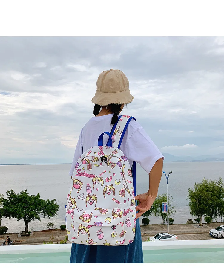 

Japanese anime Sailor Moon Fashion personality Pink white Knapsack Cartoon Travelling canvas bag schoolbag Computer package gift