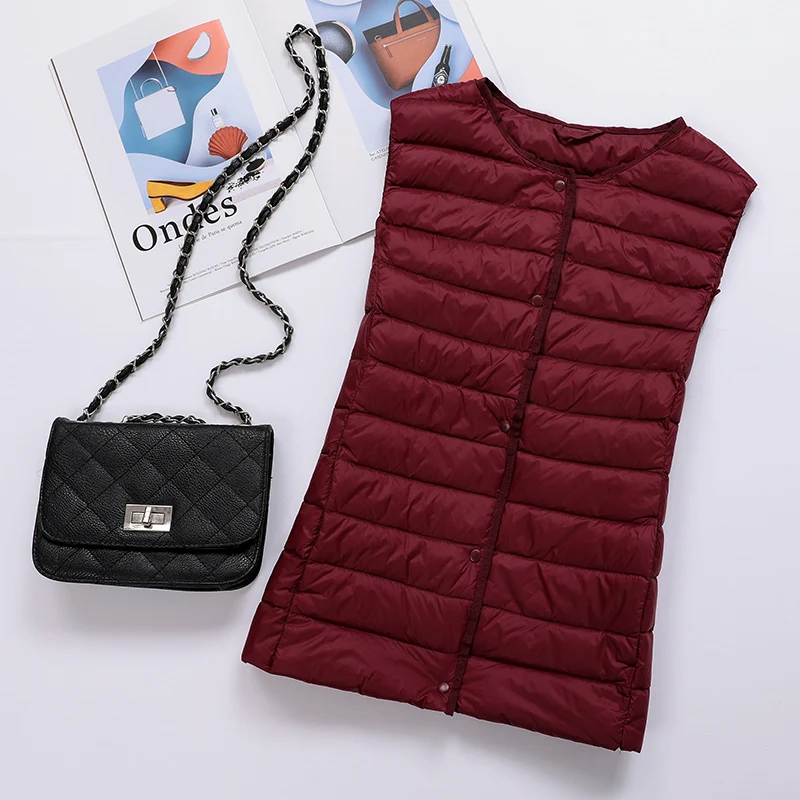 Жилет-пуховик женский ульсветильник пуховик без рукавов короткий жилет RSMJ1001 KJ4092
