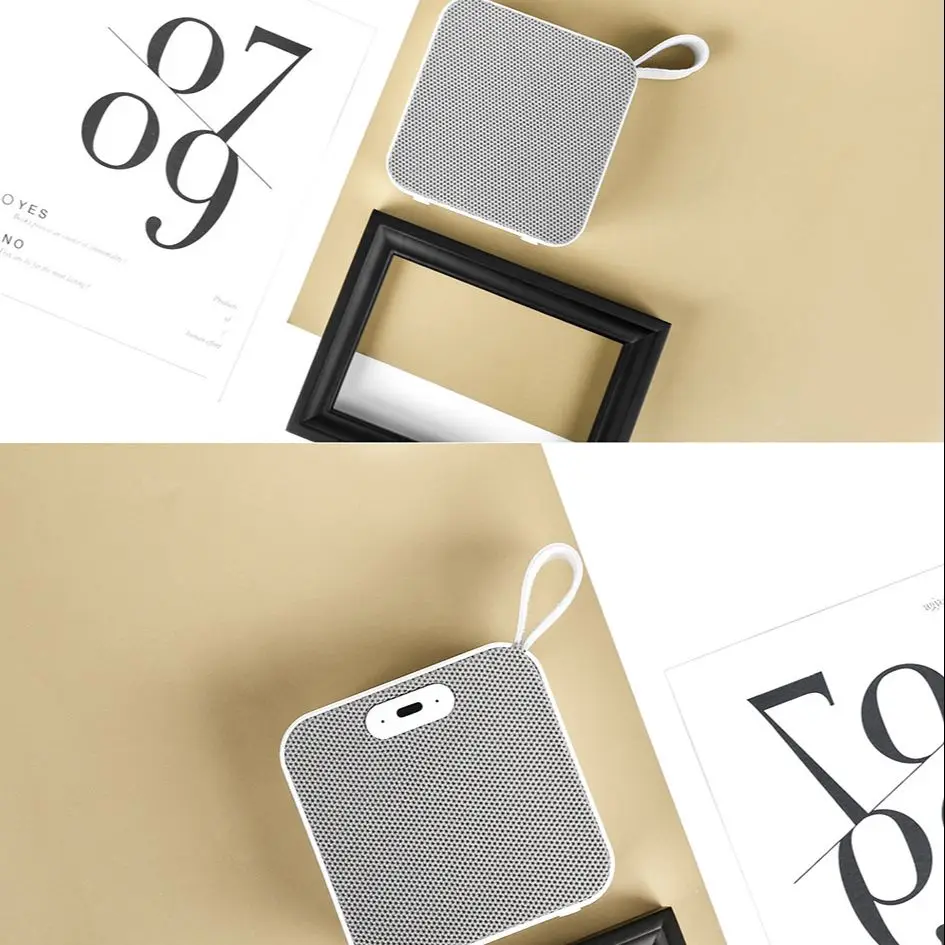 

New fabric square mini Bluetooth speaker small steel gun wireless creative gifts Bluetooth speaker private model