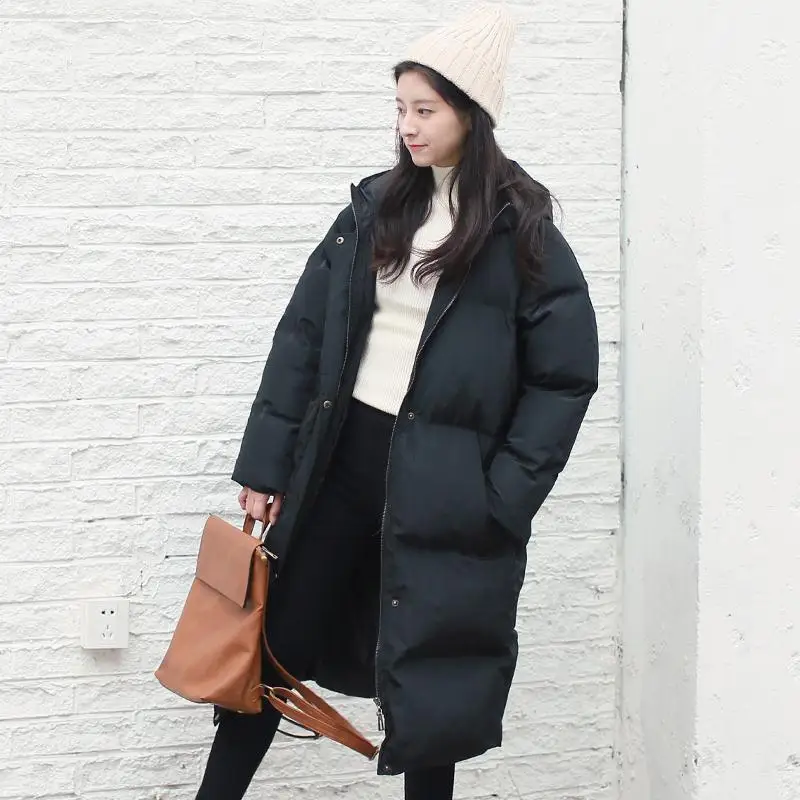 Зимняя женская хлопковая куртка средней длины мятно-зеленого цвета в