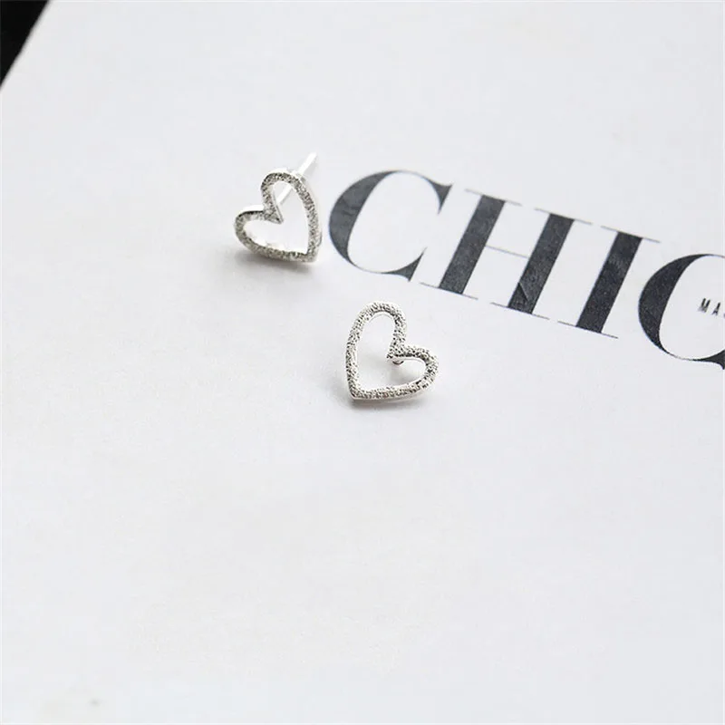 

Fashion Simple Style Mini Hollow Heart Shaped Silver Color Stud Earrings For Women Girls Ear Jewelry Birthday Gifts