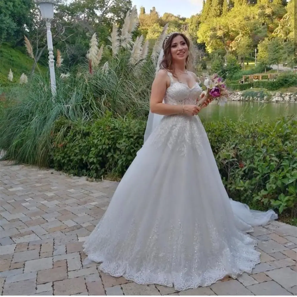 

Wedding Dress Luxury 2020 Ball Gown Shiny Lace Appliques Sweetheart Spaghetti Strap With Court Train Bridal Gowns Sleeveless