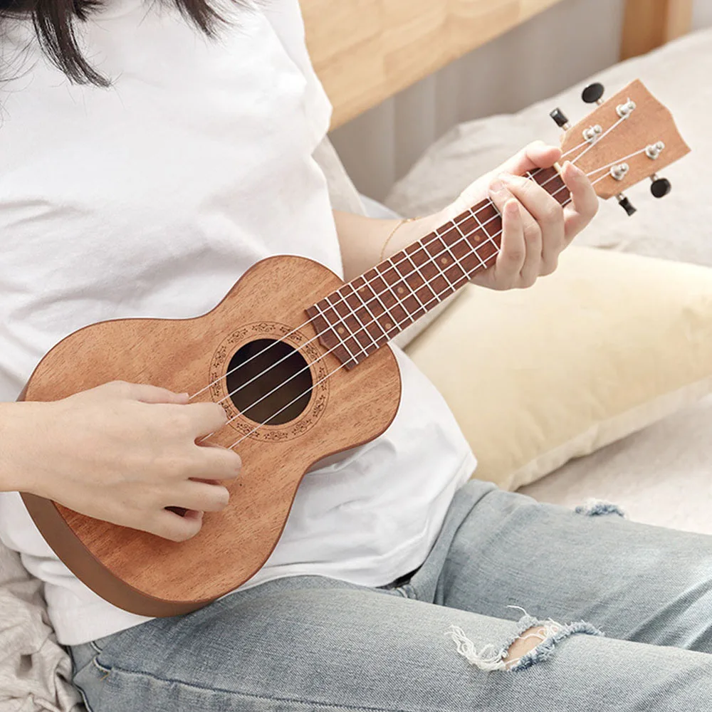 

21 inch Kids Imitation Wood UKulele 4-String Portable Guitar Instrument for Children Pick Stringed Instruments Mini Guitars