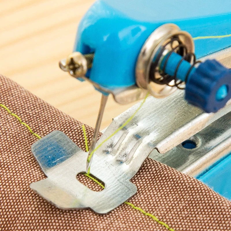 швейная машинка fhsm 315. машинка для рукоделия. ручная мини швейная машина изнутри. портативная мини швейная машинка mini sewing machine. портативная швейная машина ручная.