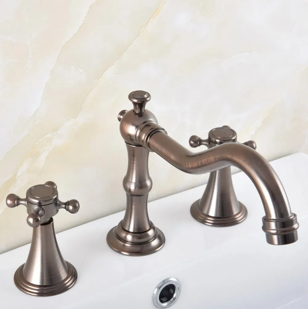 

Brown Oil Rubbed Antique Brass Deck Mounted Dual Handles Widespread Bathroom 3 Holes Basin Faucet Mixer Water Taps mnf588