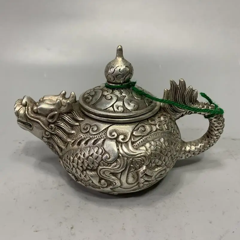

Коллекция архаизмов белый медный чайник с драконом статуя ремесла